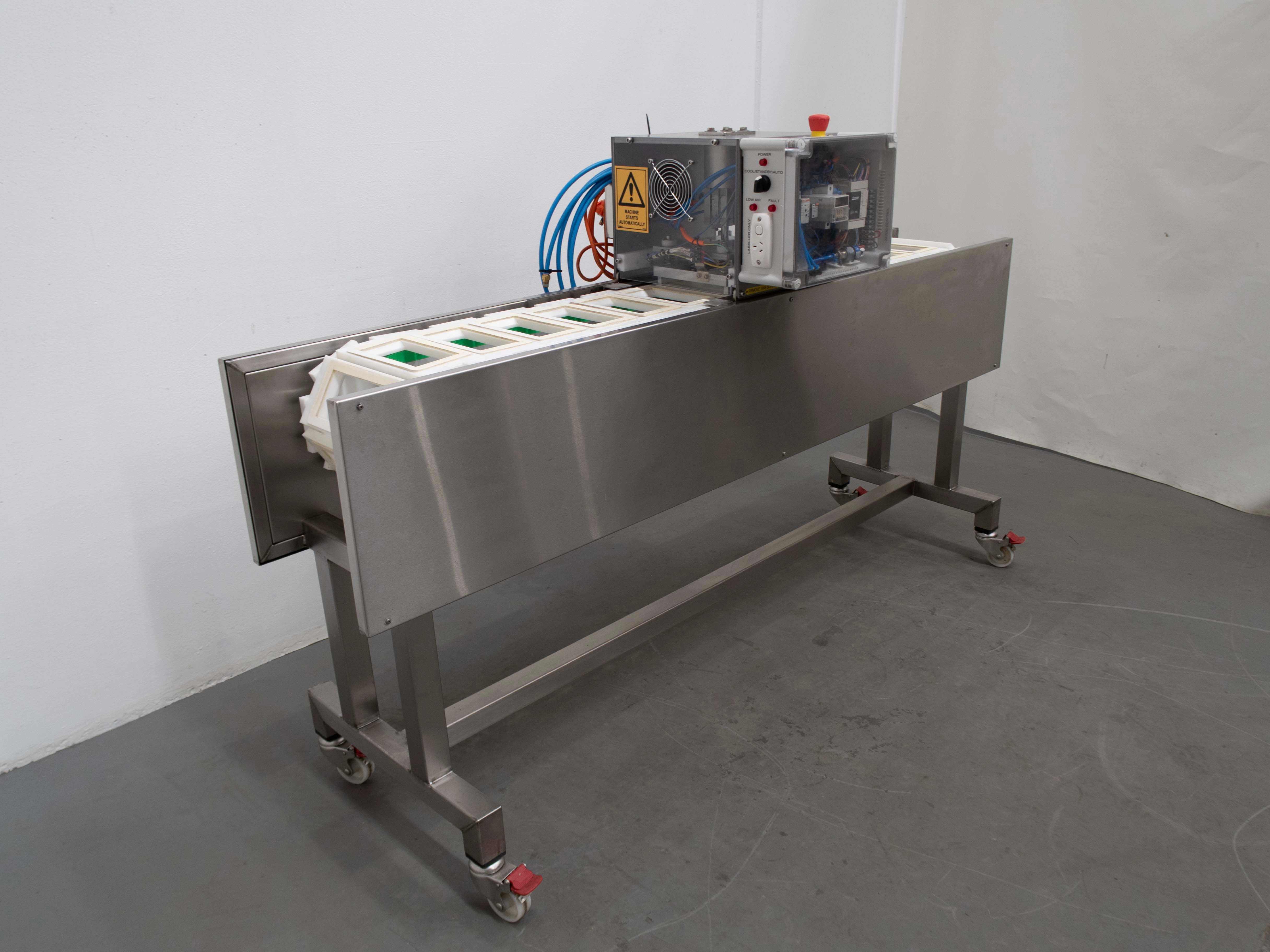 Pneumatic Sandwich Wedge Packeting Machine